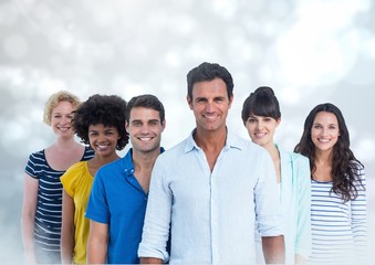 Smiling Group Portrait against a grey background