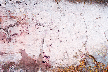 Wall fragment with scratches and cracks