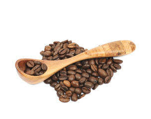 Heart shaped pile of coffee beans isolated