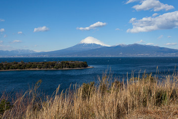Mountain fuji and Japan sea in winter seen from Izu city , Shizuoka prefecture