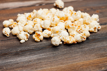 wooden background and popcorn