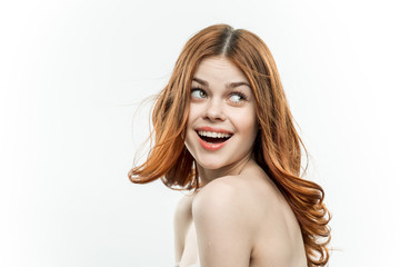 Obraz premium cheerful woman with bare shoulders