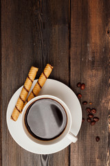 chocolate tubes and a cup with a drink