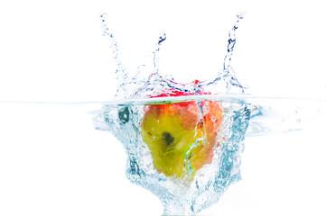 Fresh fruits immerced in clear water, studio shot