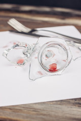 transparent dishes, glass, fork on a napkin