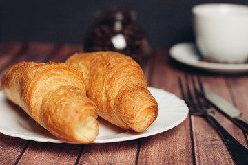two croissants on a plate
