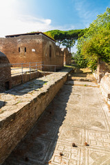 Street and roman mosaic floor at Ostia Antica Italy