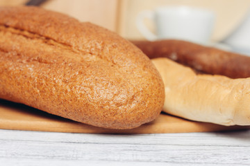 baguette loaf on chopping board