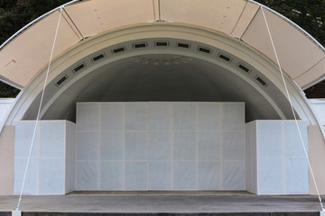 Outside theatre in city.