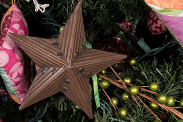 Tin Star Ornament on Christmas Tree