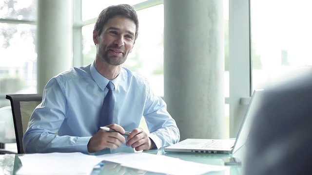 Businessman meeting with client in office