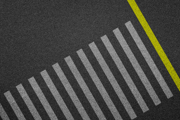 Empty crosswalk on asphalt road top view