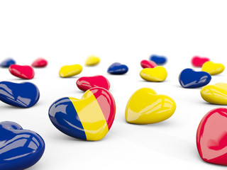 Heart with flag of chad isolated on white