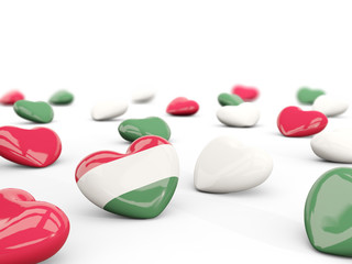 Heart with flag of hungary isolated on white