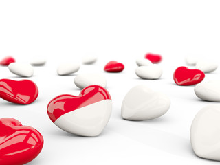 Heart with flag of indonesia isolated on white