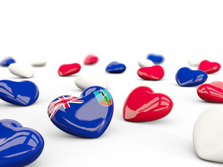 Heart with flag of montserrat isolated on white