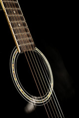 Naklejka premium Six string guitar against a dark backgro