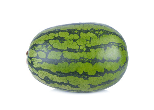whole ripe yellow watermelon with stem on white background