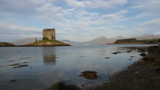 Castle Stalker reflected in Loch Laich Scotland
