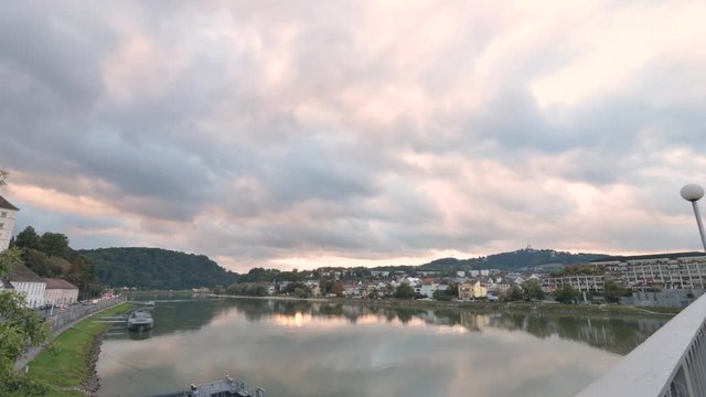 Cloudy early evening time lapse of the Danube River in Linz Austria.