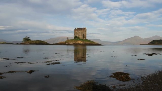 Castle Stalker reflected in Loch Laich Scotland
