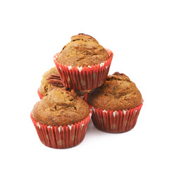 Pile of pecan nut cupcakes isolated