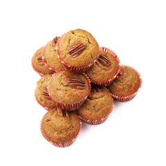 Pile of pecan nut cupcakes isolated