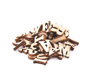 Pile of wood carved letters isolated