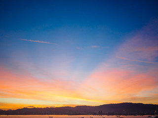 Sunset on Penang island city. Beautiful landscape with dark blue and yellow sky.