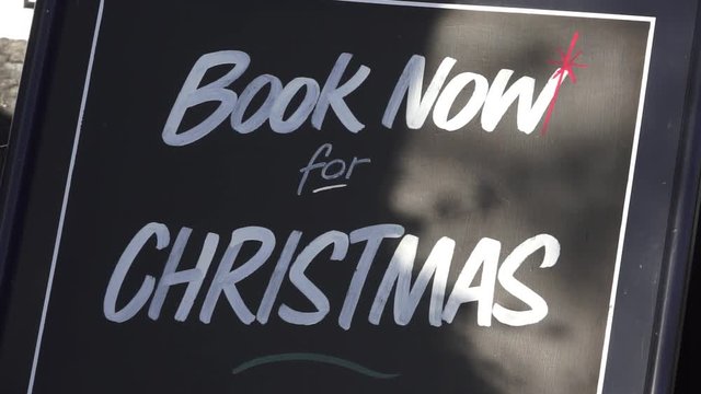 Book Now Christmas Sign