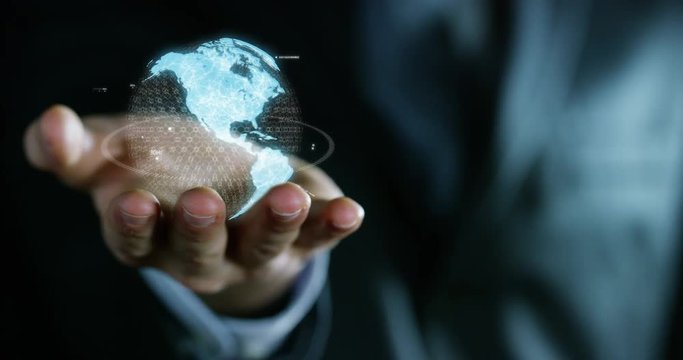 world growing in the hands of an experienced seller or bank or insurance broker. concept for investment and passive income for retirement and annuities also health insurance concept or bank 