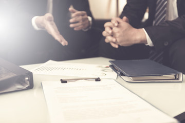 business partners signing contract after business success negotiation 