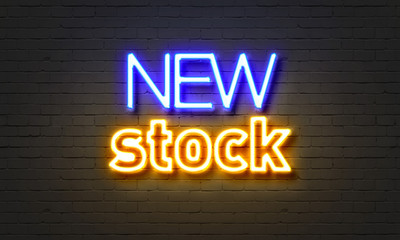 New stock neon sign on brick wall background.