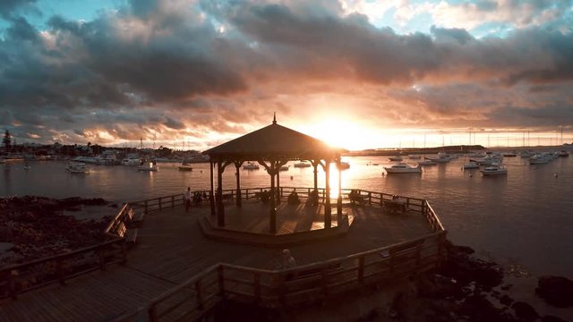 Waterfront pavilion overlooking harbor at sunset, Punta del Este, Uruguay