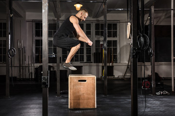 Man Doing A Box Jump Exercise
