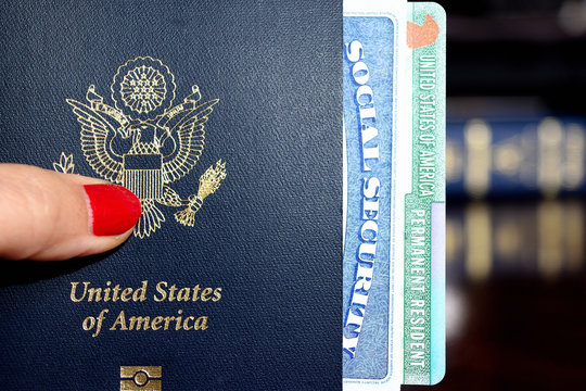 American passport, permanent resident card and social security number card