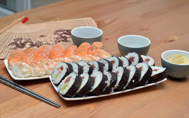 maki sushi rolls and nigiri sushi on plate japan food on the table detail