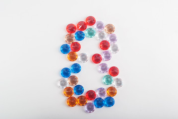 Multicolored faceted stones