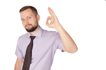 Young business man shows "OK" gesture and smiling