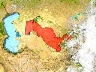 Uzbekistan on map with clouds