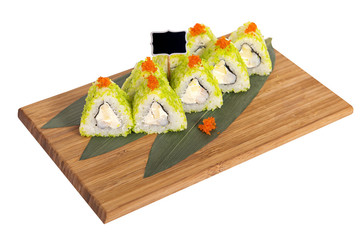 Sushi rolls on wooden Board with leaves of leeks and black sign for logo and name