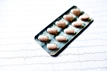 Pill on a cardiogram trace