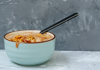Homemade breakfast banana ice cream with peanut butter in the bowl.  Love for a healthy vegan food concept