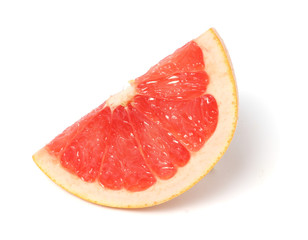 Fototapeta na wymiar pieces of grapefruit on wood on white
