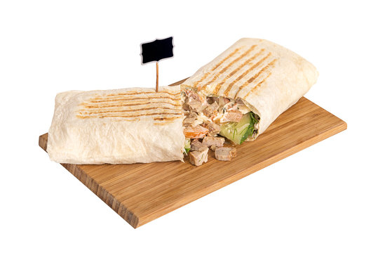 The Doner kebab on wooden Board on white isolated background with a black sign to put the name or logo