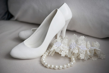 wedding white womens shoes and accessories on gray background