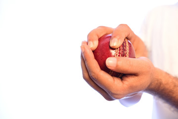 Close-up of cricket bowler grip