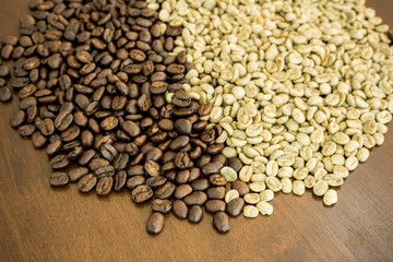 roasted coffee beans on the wooden table, can be used as a background