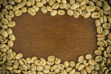 roasted coffee beans on the wooden table, can be used as a background