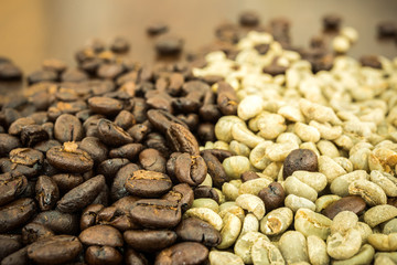 roasted coffee beans on the wooden table, can be used as a background